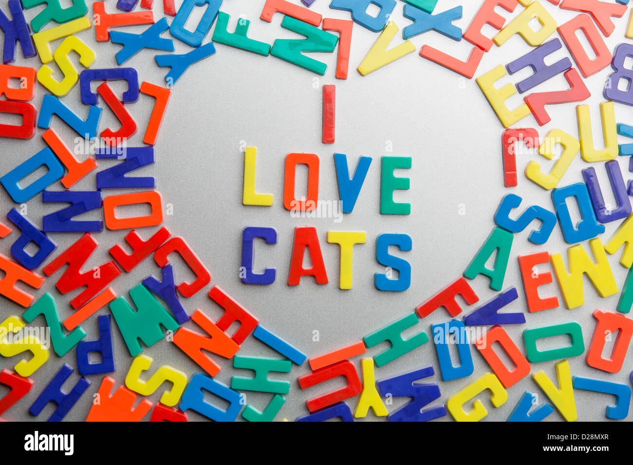 'I Love Cats' - refrigerator magnets spell messages out of a jumble of letters Stock Photo