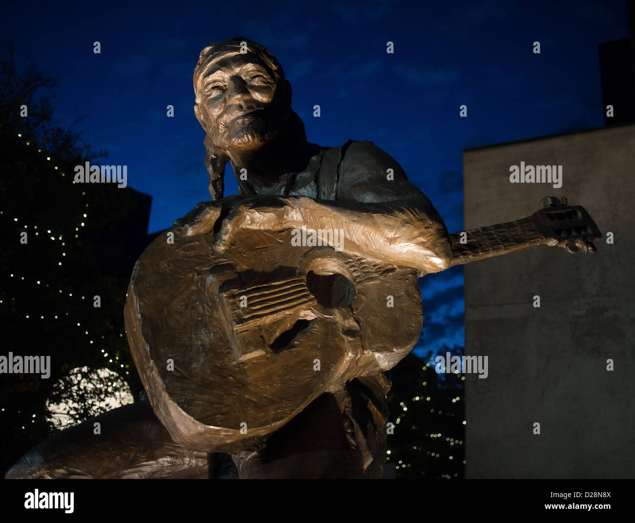 Bronze statue of Willie Nelson by Clete Shields in front of the Austin City Limits Live stage at Moody Theater in Austin, Texas Stock Photo