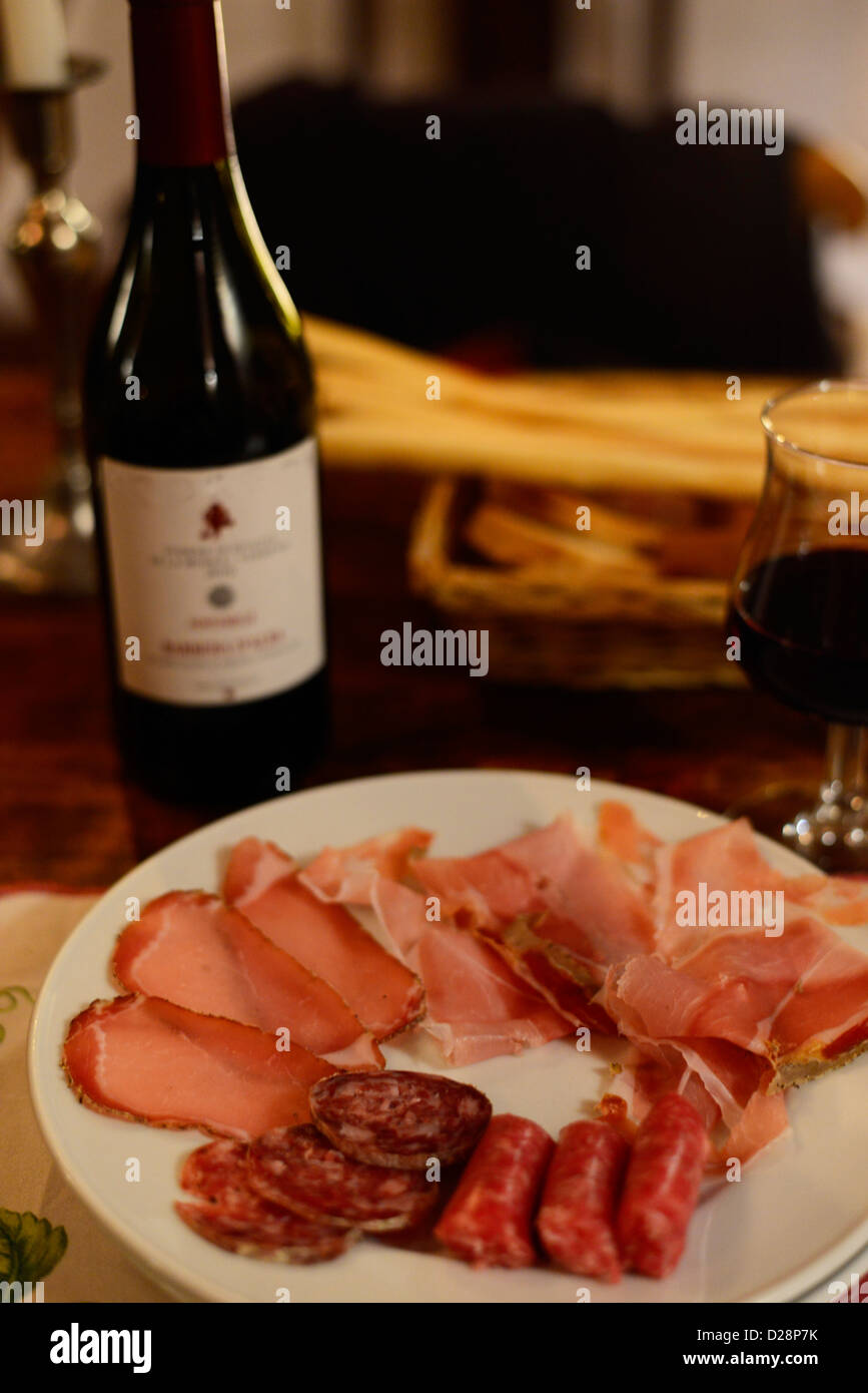 Traditional Piedmont cured meats served with a good Barbera wine. Stock Photo