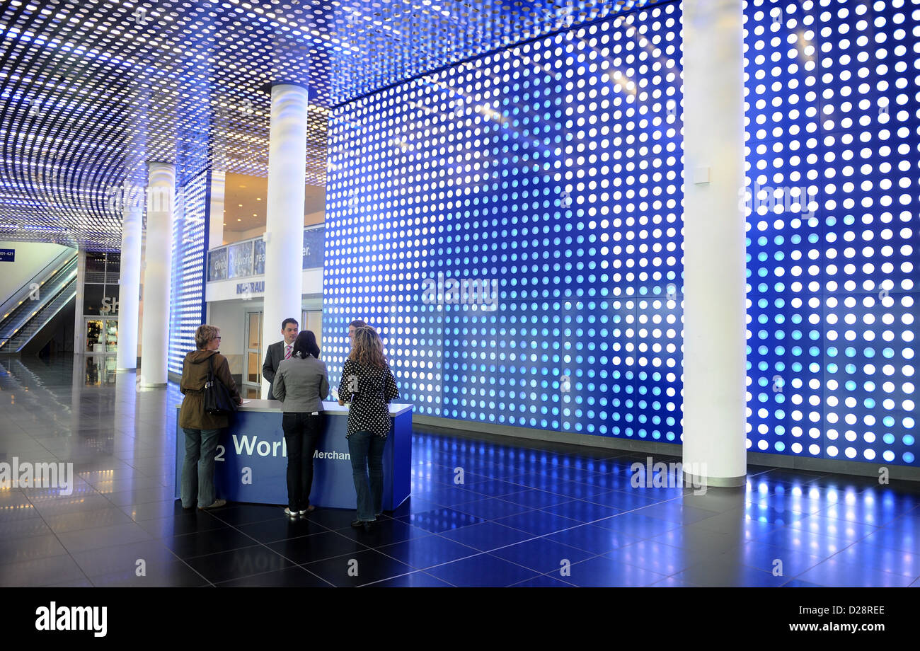 Berlin, Germany, visitors stand at the information desk at the entrance at the O2 World Arena Stock Photo