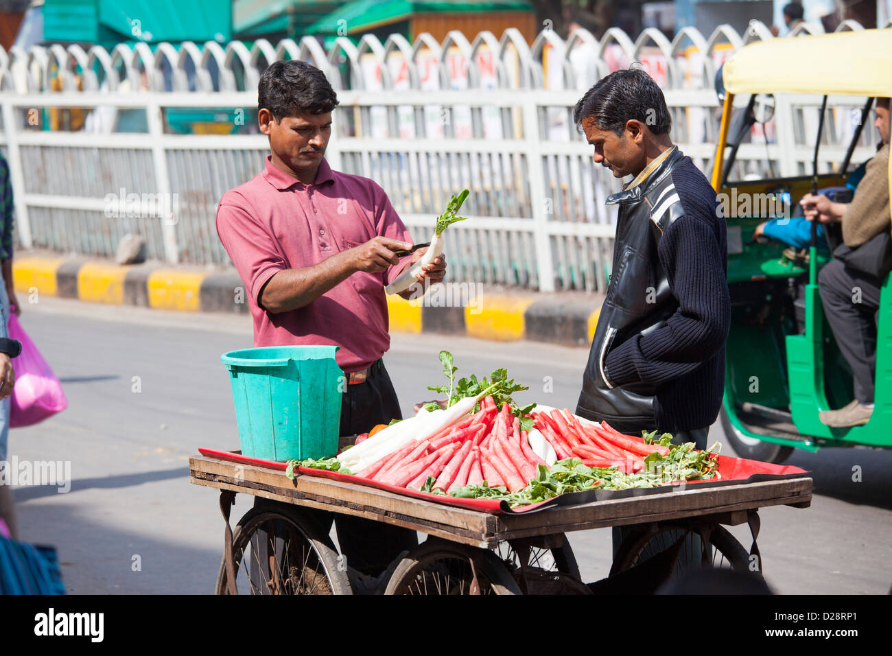 Red carrot and root vegetable vendor, Delhi, India Stock Photo