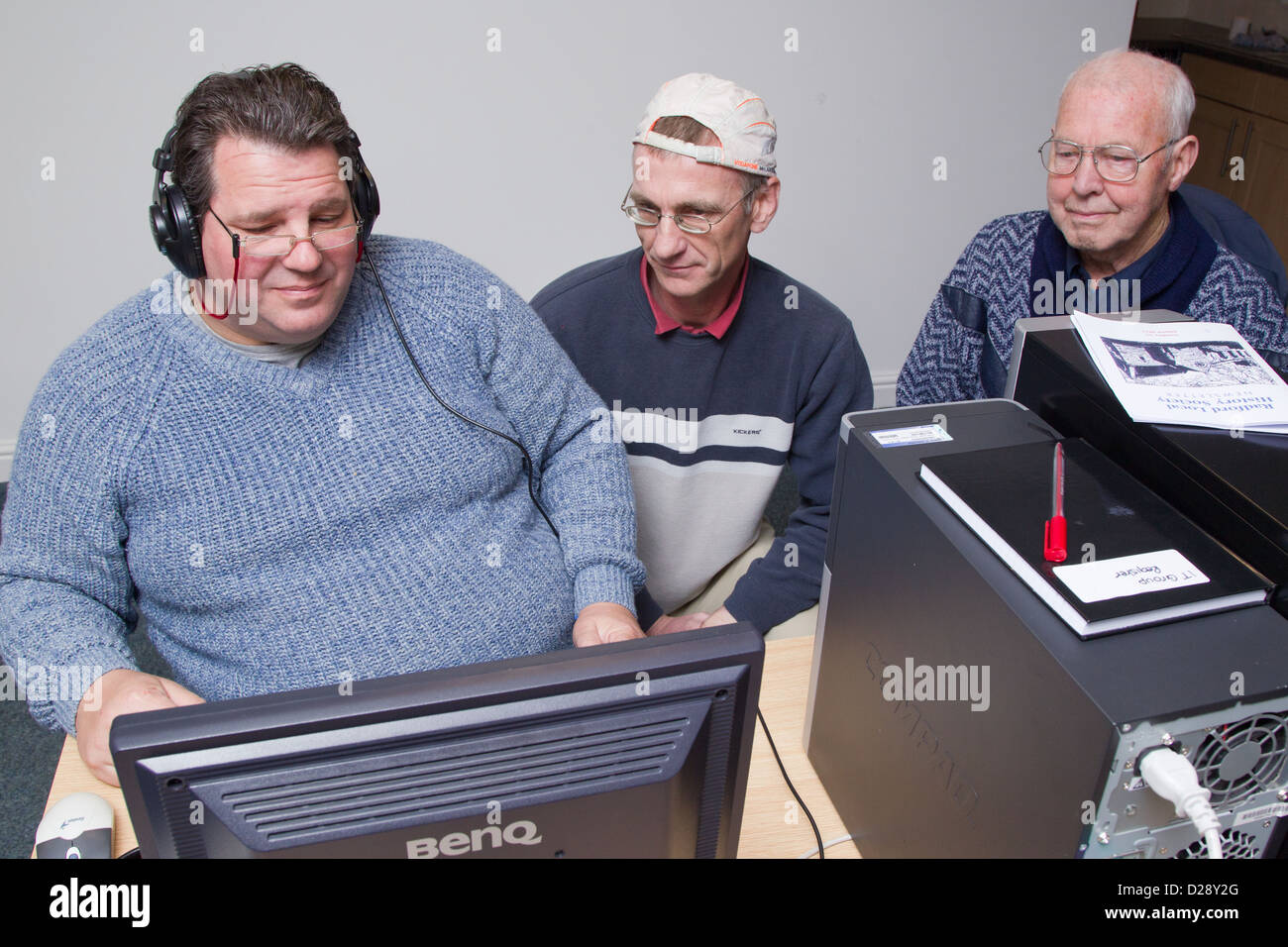 Computer class for people with visual impairments - group of men ...