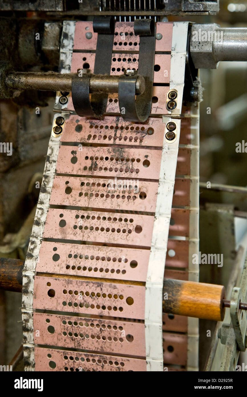 Punched cards controling the weavin Stock Photo