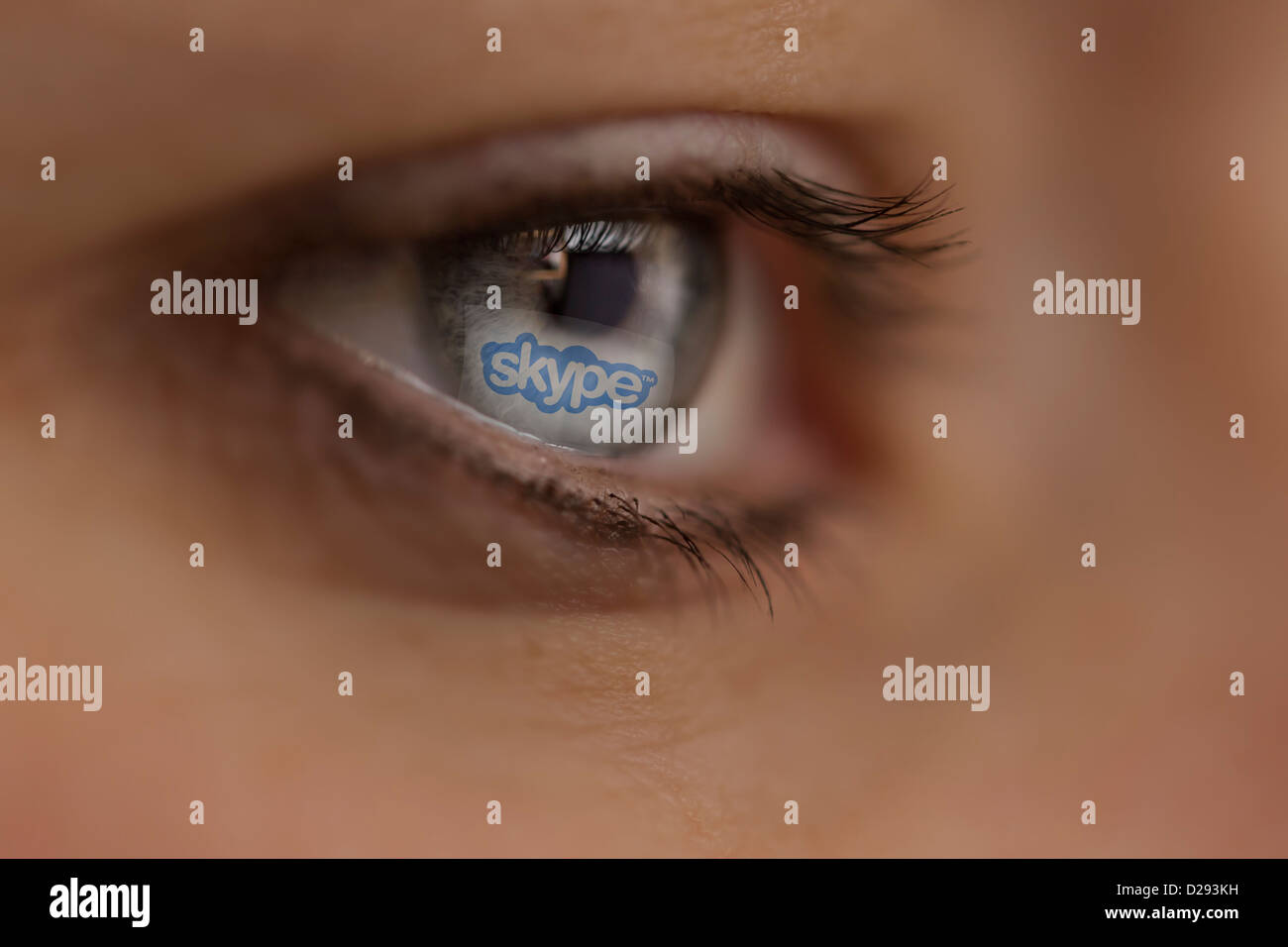 Woman looking at Skype Internet site Stock Photo