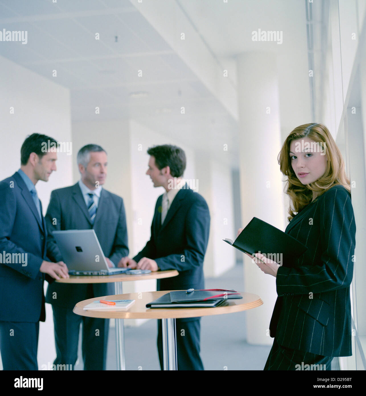 business people man woman using laptop License free except ads and outdoor billboards Stock Photo