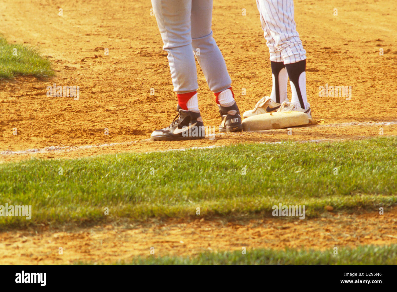 High school baseball game legs feet runner base baseman sports hires