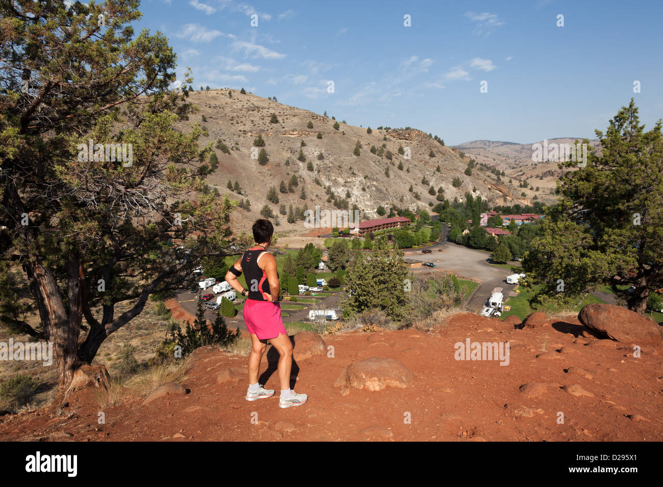 Woman looking over the view of RV campground at Kah-Nee-Ta Resort, near Warm Springs, Oregon, USA Stock Photo