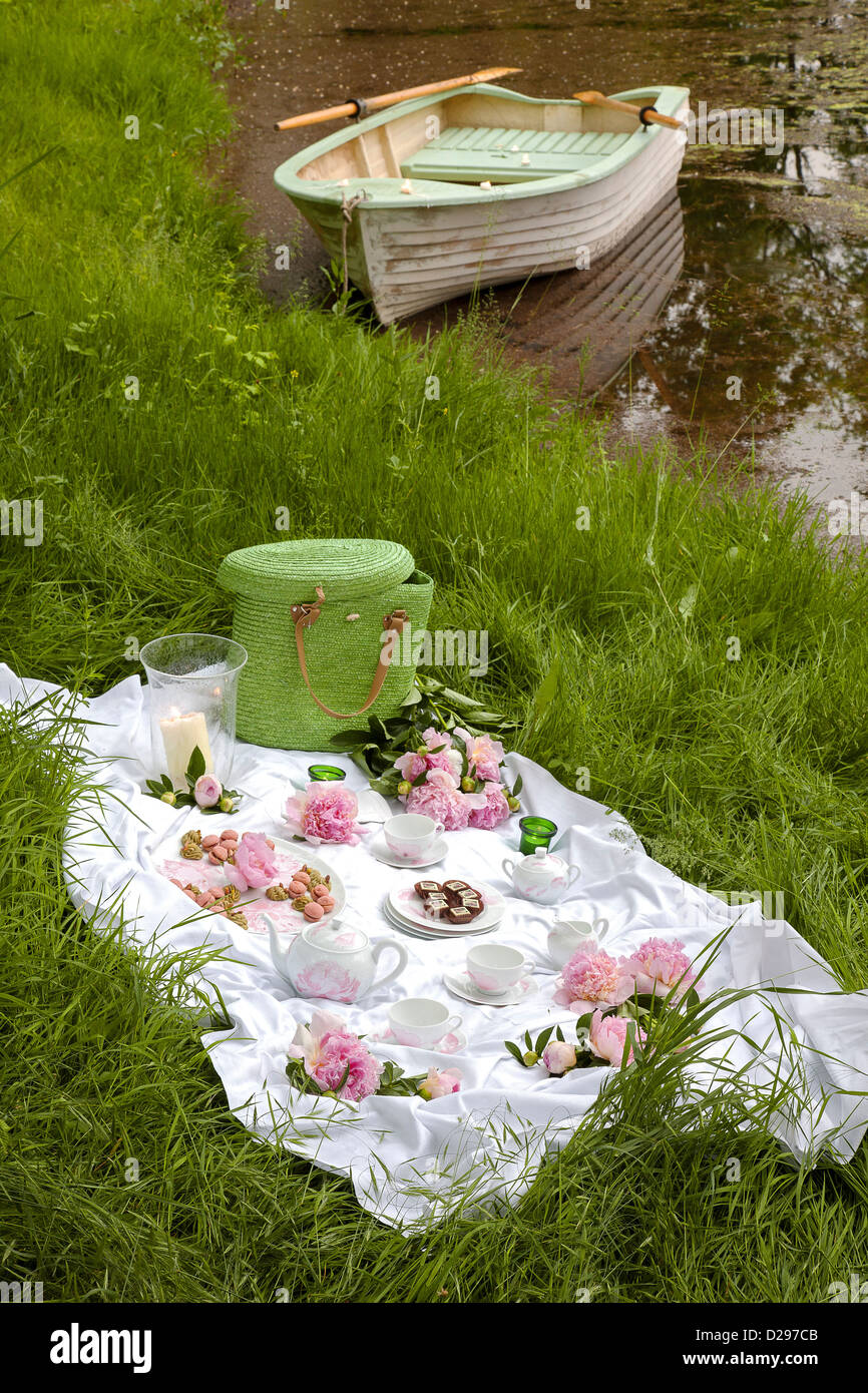 Romantic lakeside picnic. Piemonte, Italy. Stock Photo