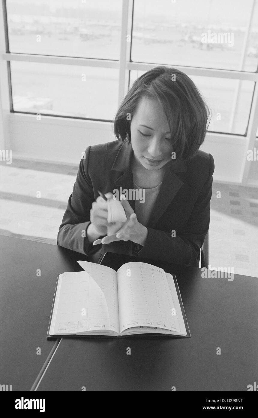 black and white business frustration stress businesswoman stressed License free except ads and outdoor billboards Stock Photo