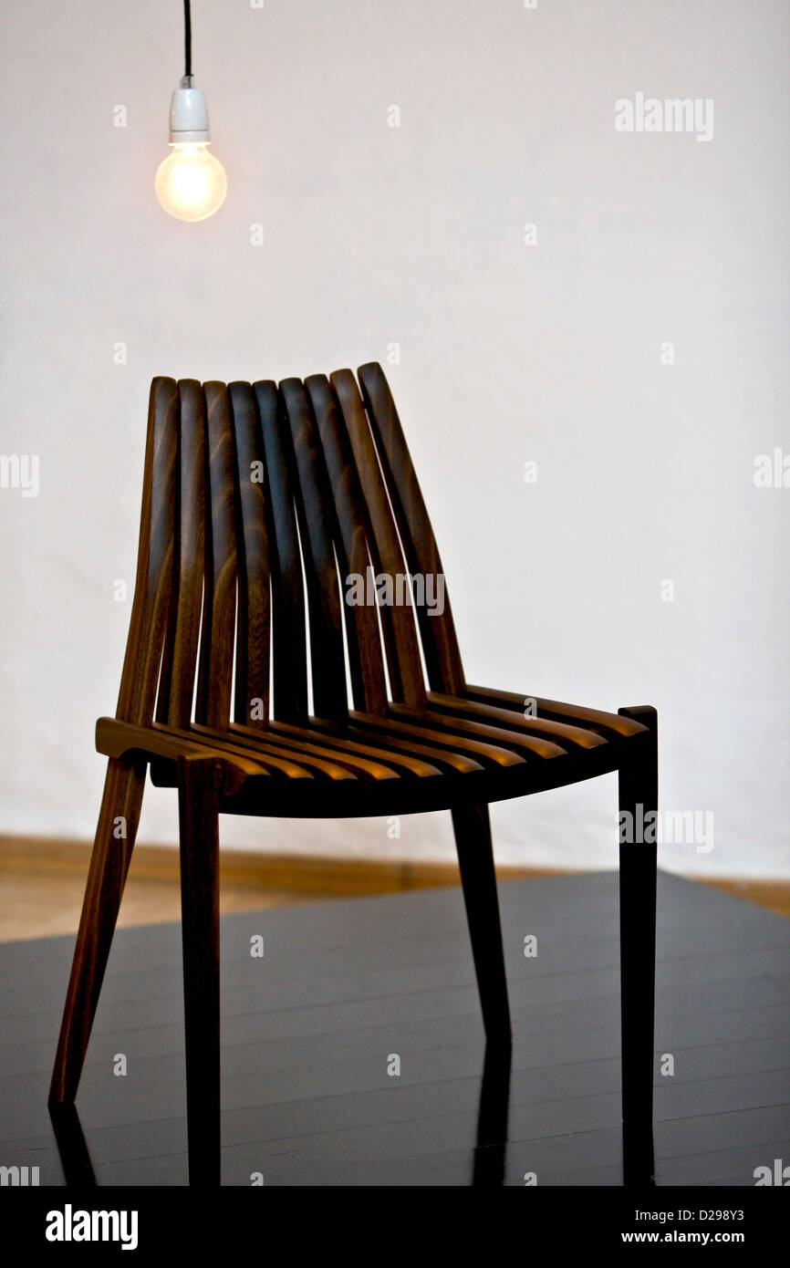 Modern wooden designer chair Stock Photo Alamy