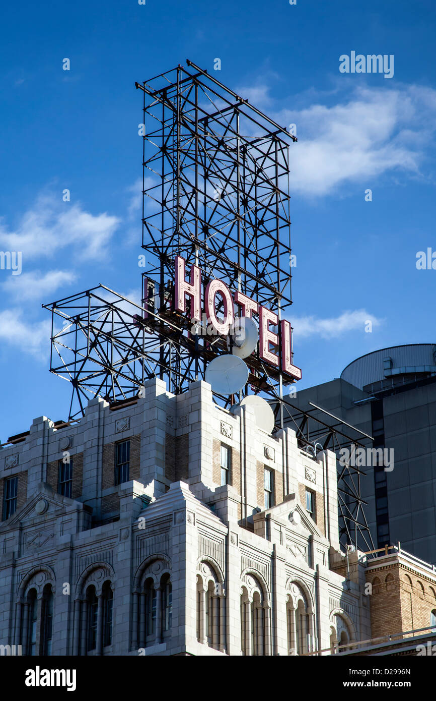 Hotel sign on the billboard against blue sky Stock Photo - Alamy