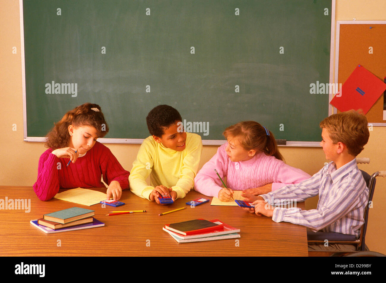 Elementary Students Working With Calculators Stock Photo Alamy