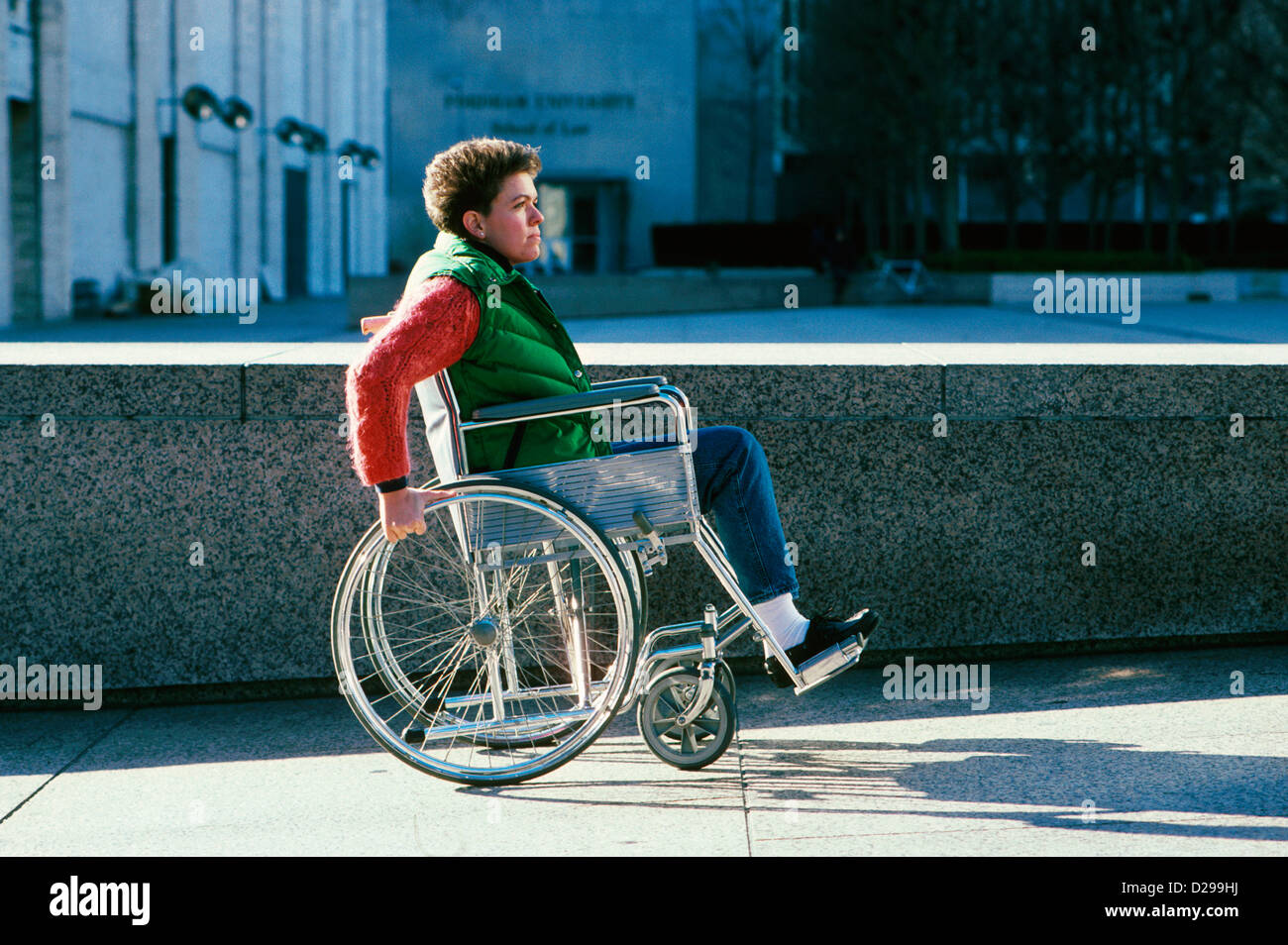 Woman In Wheelchair Using Handicapped Ramp Stock Photo - Alamy