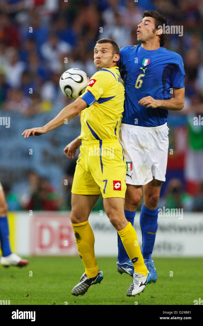 Andriy Shevchenko of Ukraine (L) and Andrea Barzagli of Italy (R) battle for the ball during a FIFA World Cup quarterfinal match Stock Photo