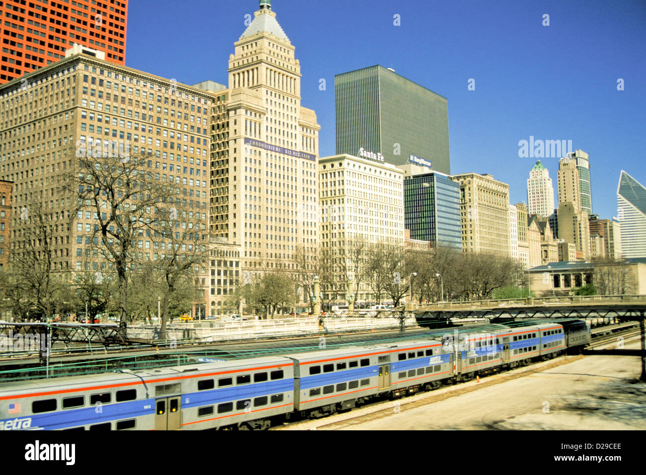 Illinois. Chicago. South Michigan Avenue Buildings And Metra Commuter Train. Stock Photo