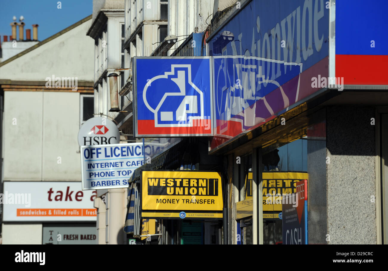 Western Union money shop and Nationwide bank or Building Society signs Brighton UK Stock Photo