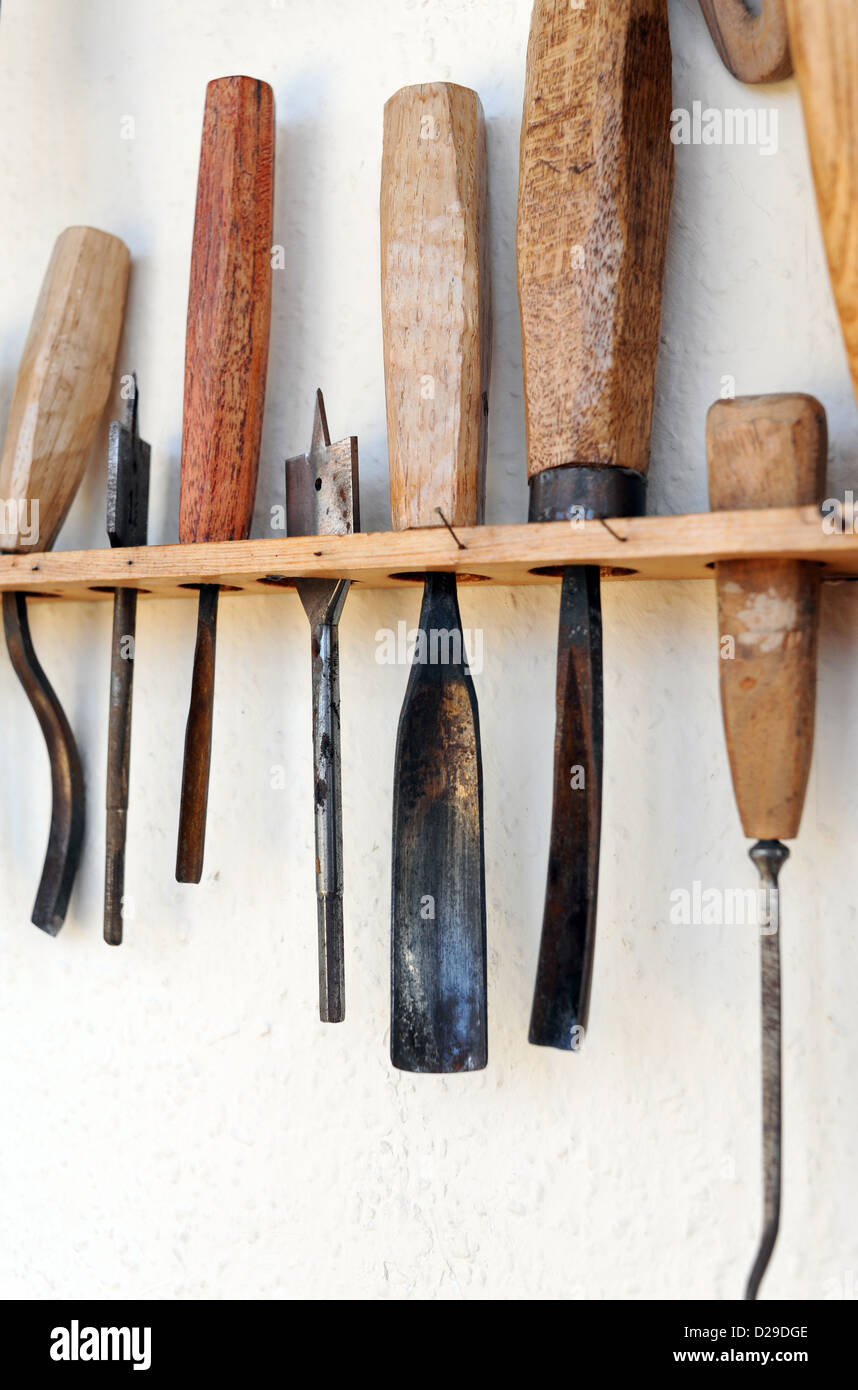 Wood sculpture hand made tools Stock Photo