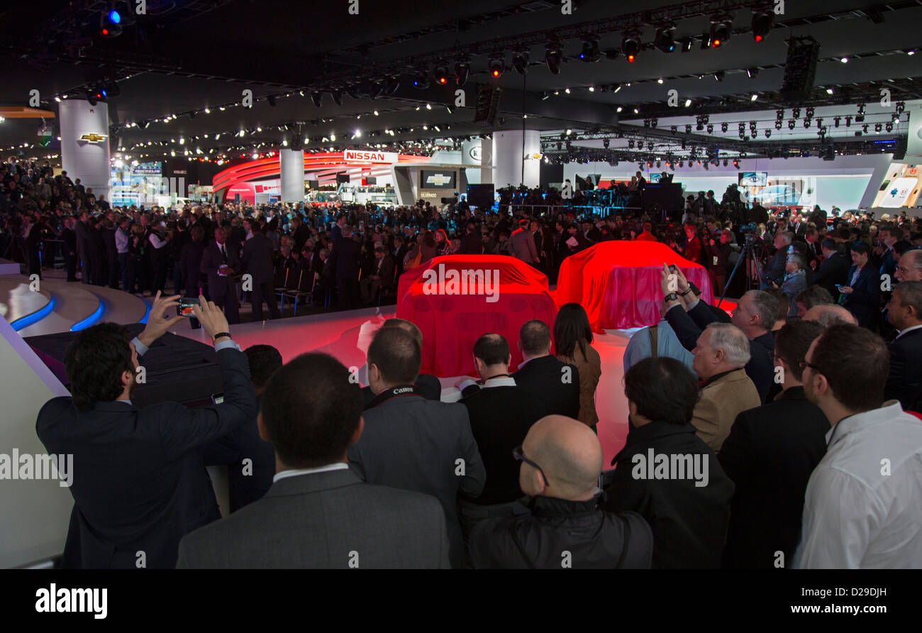 Journalists await the unveiling of the Chevrolet Corvette Stingray at the North American International Auto Show. Stock Photo