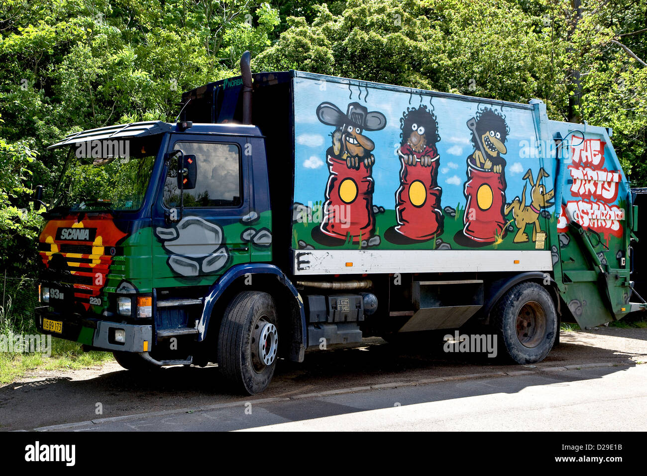 Graffiti painted garbage truck Stock Photo