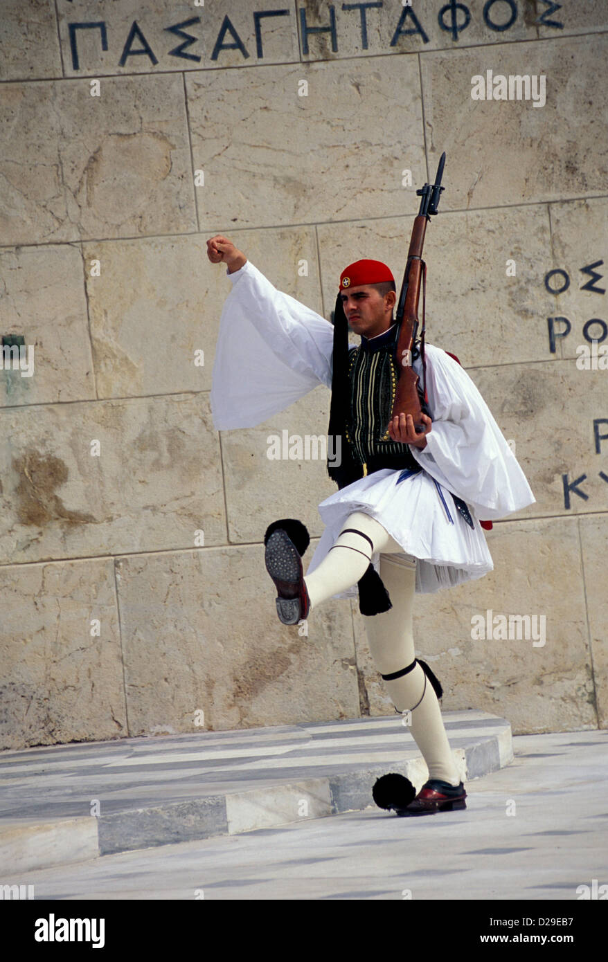 Greece, Athens. Soldier Marching At The Tomb Of The Unknown Soldier. Stock Photo