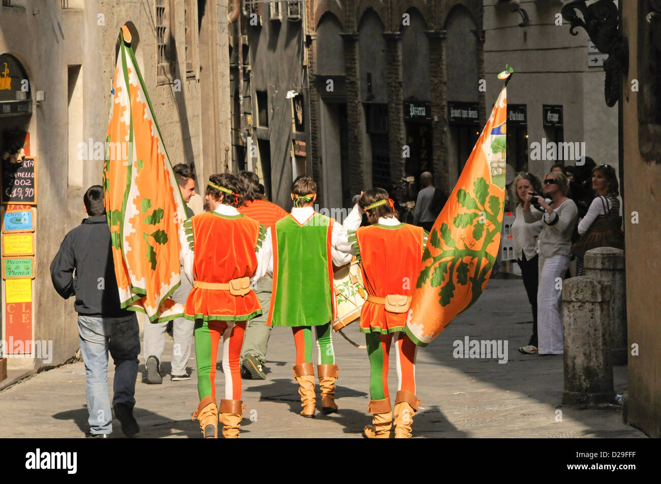 Medieval Costumes And Flags On Festival Day In Siena, Italy Stock Photo