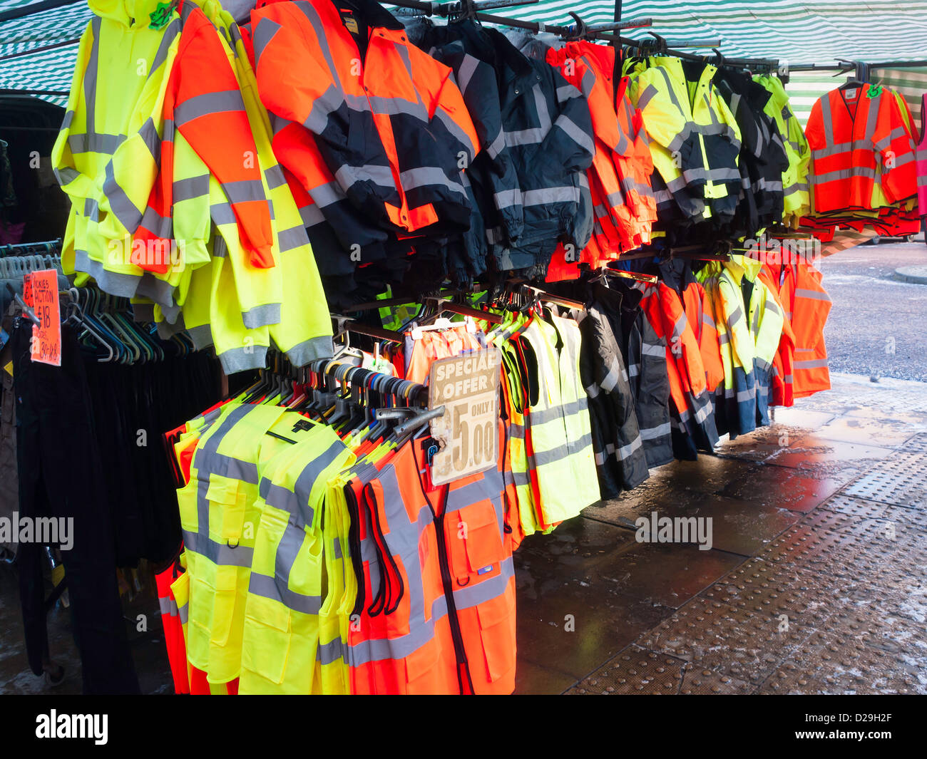 Low cost high visibility  work clothing on sale from a market stall in the North of England Stock Photo