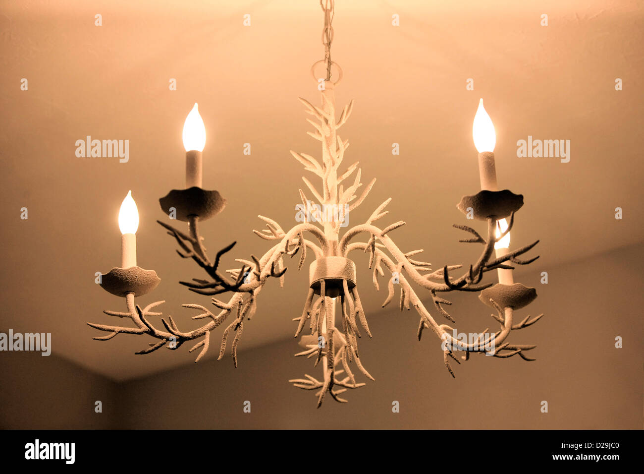 Chandelier over hangs a dining room in an apartment at Siesta Key