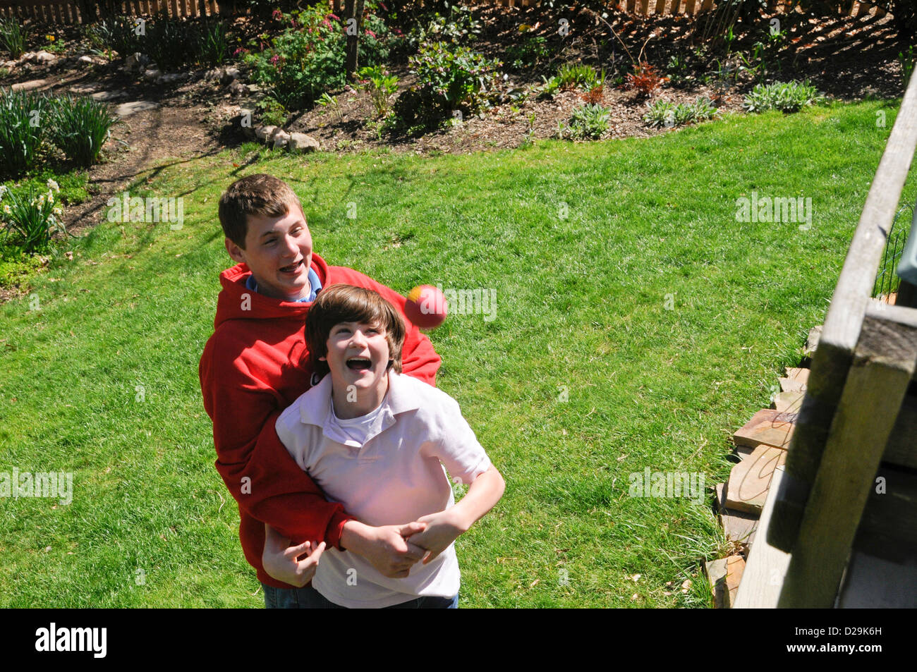 Boys Playing With Ball Stock Photo