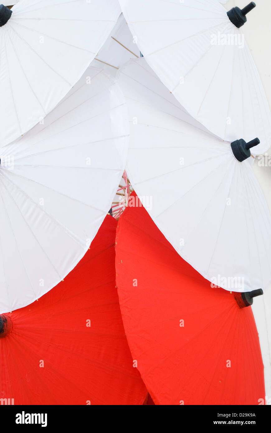 Red and white traditional umbrellas Stock Photo