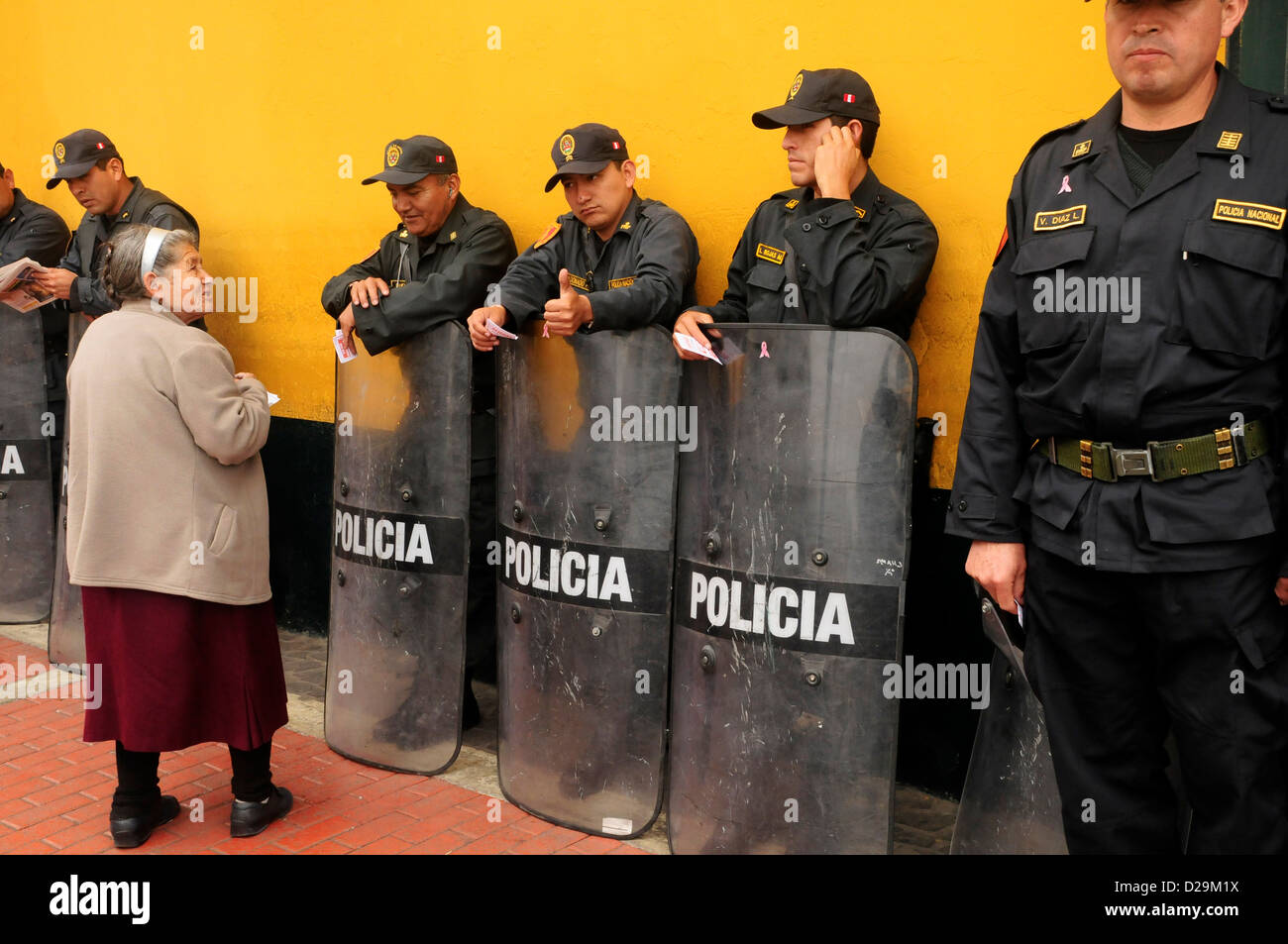 Old Women With Police, Lima, Peru Stock Photo