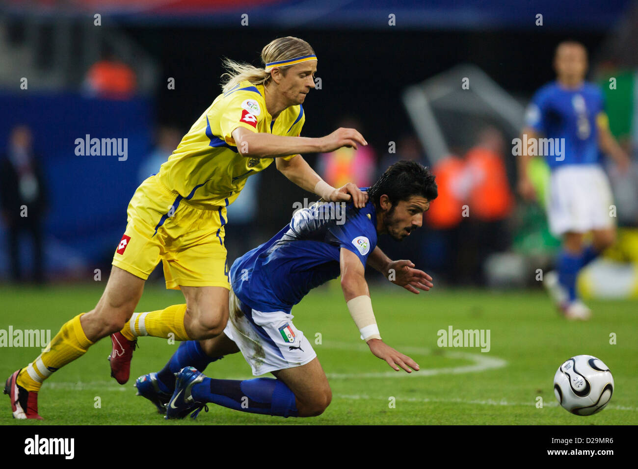 Anatoliy Tymoschuk of Ukraine (L) pushes Gennaro Gattuso of Italy (R) during a FIFA World Cup quarterfinal match. Stock Photo