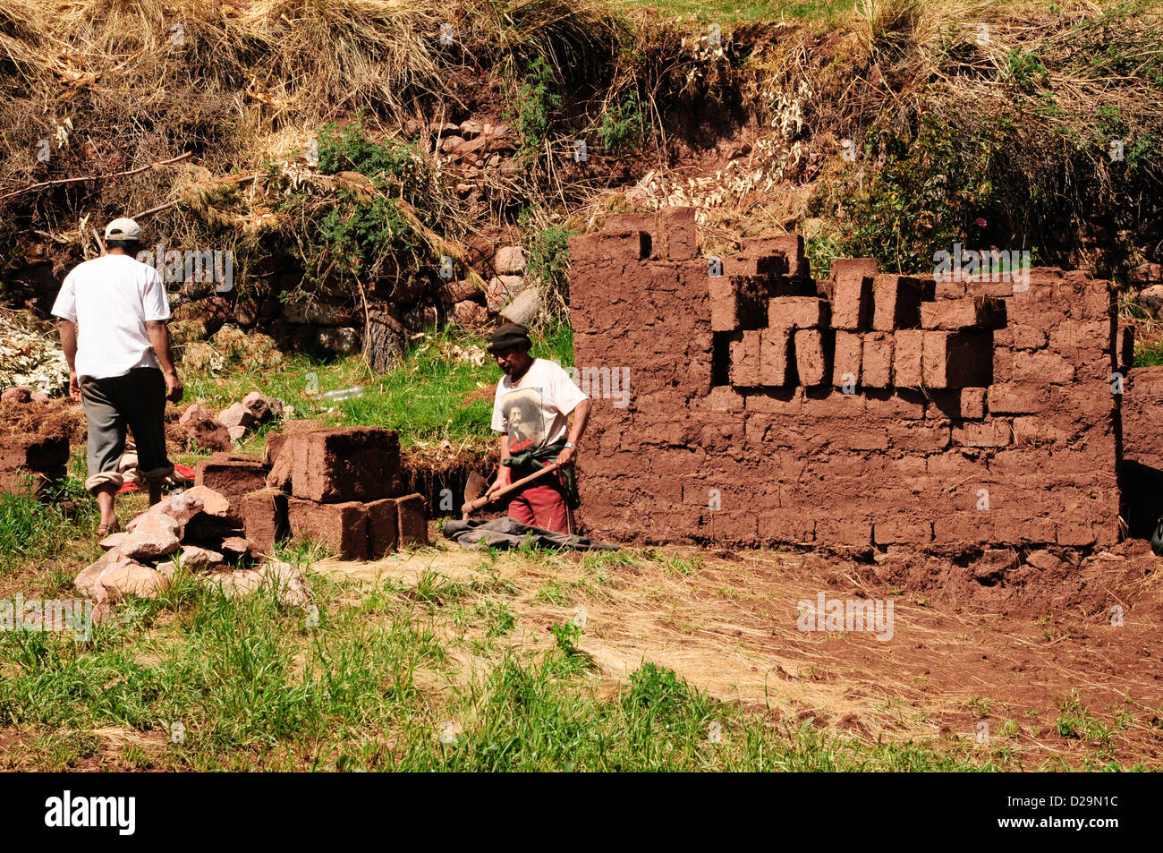 Men Making Adobe Bricks, Peru Stock Photo