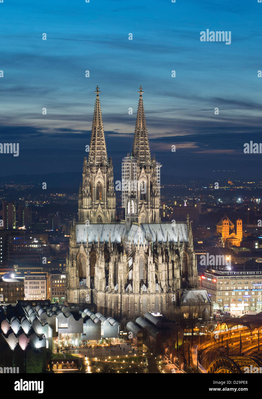 Evening view of skyline of Cologne, Germany with floodlit Cologne Cathedral prominent Stock Photo