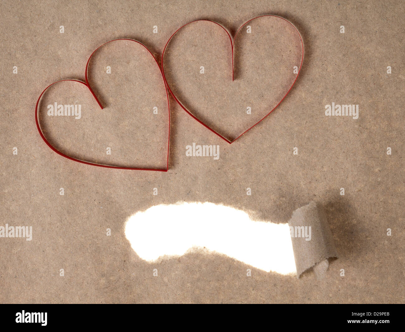 red paper hearts on recycled paper, valentines background Stock Photo ...
