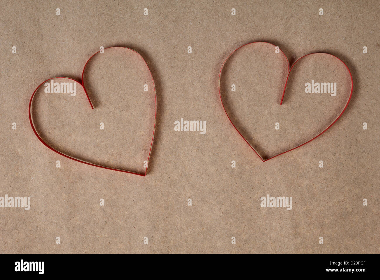 red paper hearts on recycled paper, valentines background Stock Photo ...