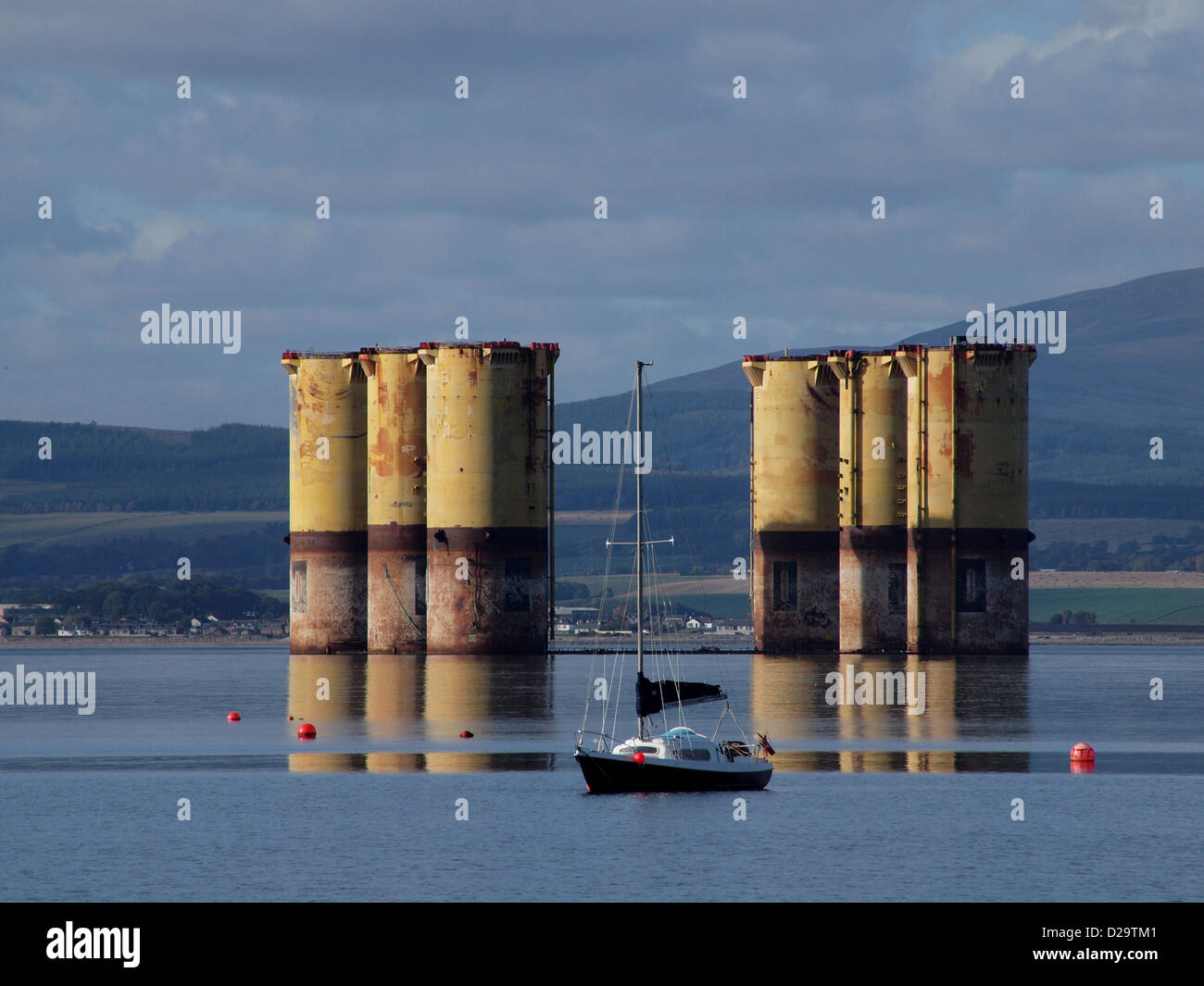 The hull of the Hutton TLP stacked in the Cromarty Firth. A redundant Oil Platform looking for a new use. Stock Photo