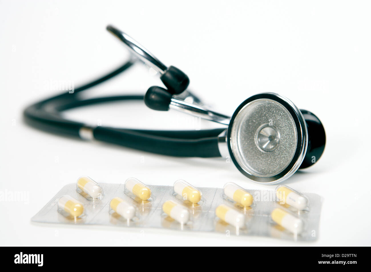 Berlin, Germany, stethoscope and tablets taped on a white background ...