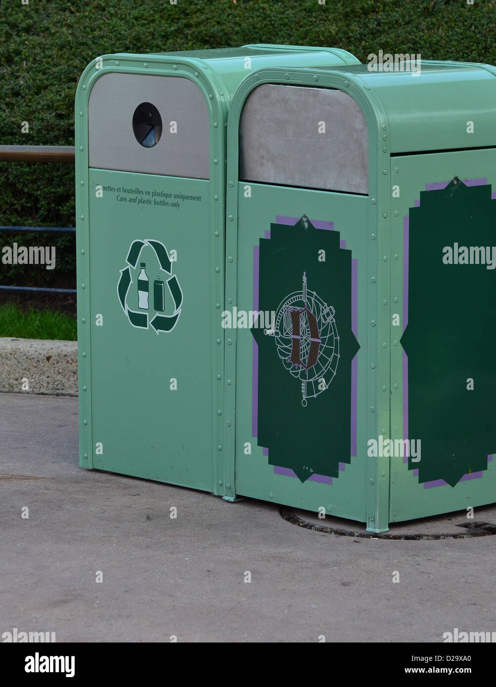 Green recycling bin and regular waste bin at Disneyland Paris Stock Photo -  Alamy