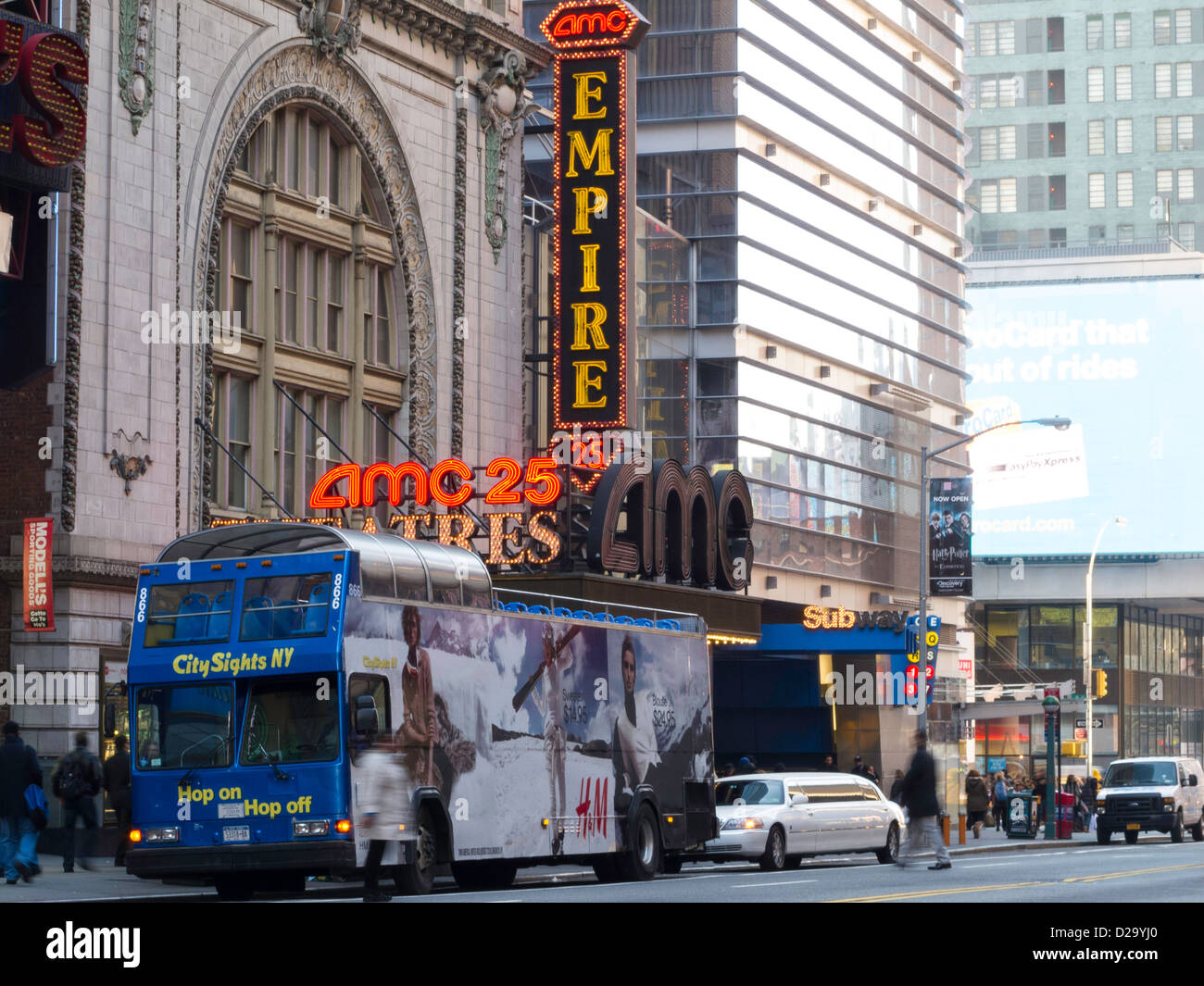 Double Decker Touring and Sightseeing Bus in Traffic, Times Square, W. 42nd Street, NYC Stock Photo