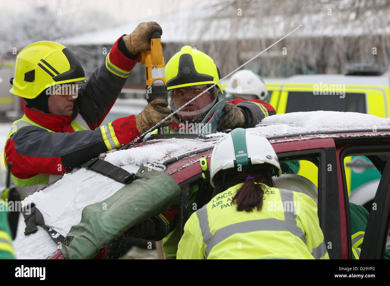 Emergency Services attending a road traffic accident involving a tractor and a car. ***NOTE TO EDITORS THIS IS A STAGED IMAGE*** Stock Photo