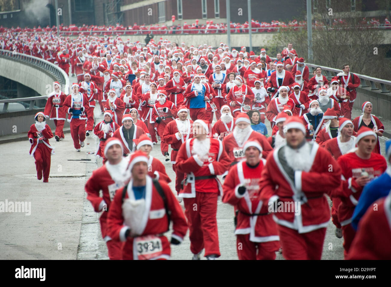 Thousands of Father Christmas Fun Run Red Stock Photo Alamy