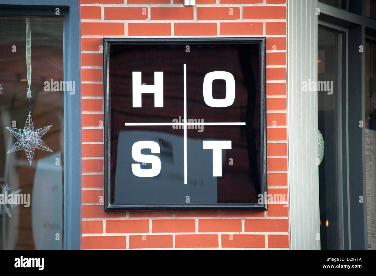 HOST H O S T Square Sign Stock Photo