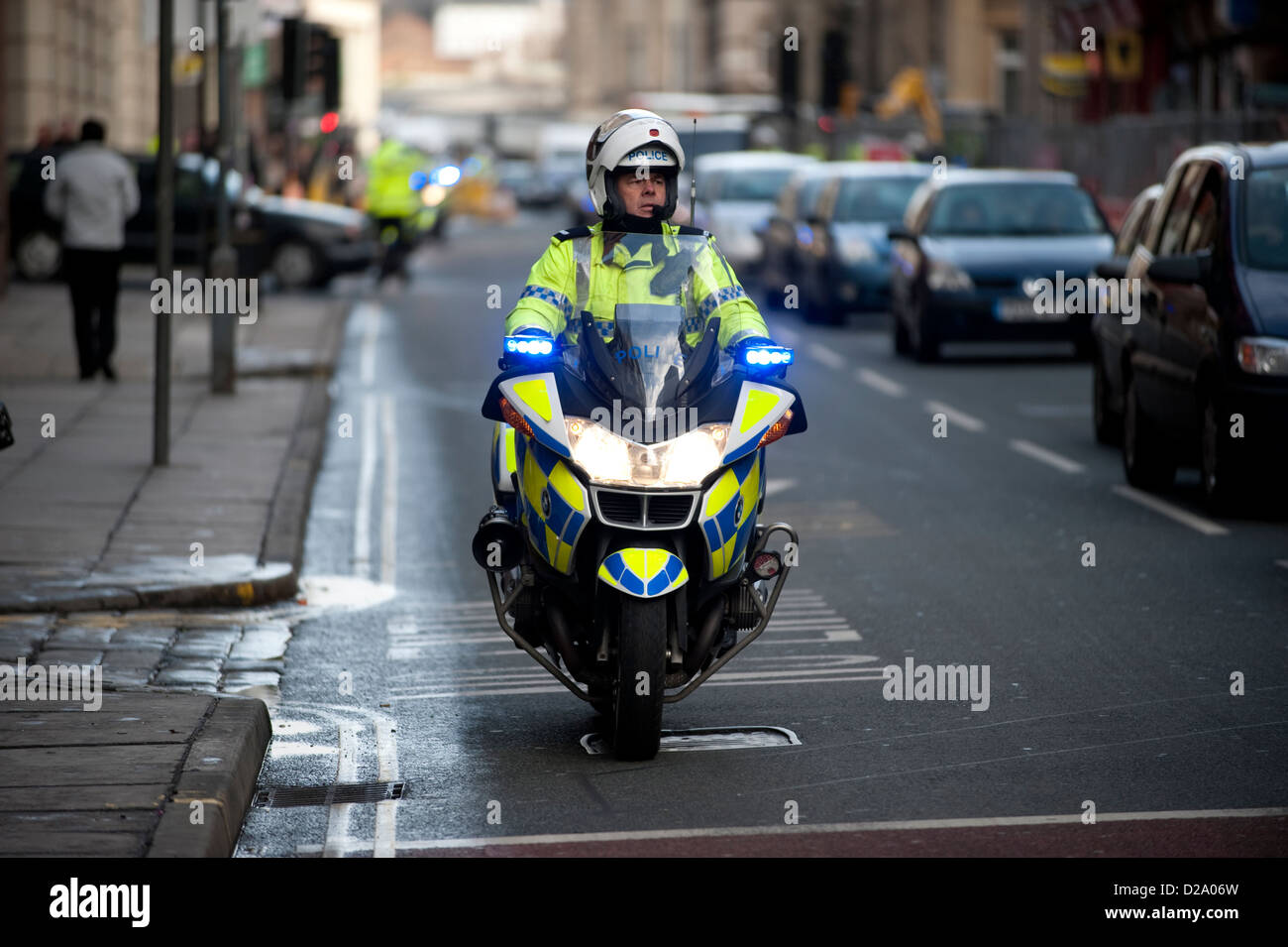 Police Motorcyclist responding on Blue Lights Stock Photo