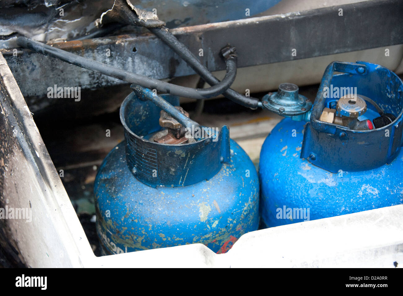 Blue Butane gas cylinder fire burnt accidental Stock Photo Alamy