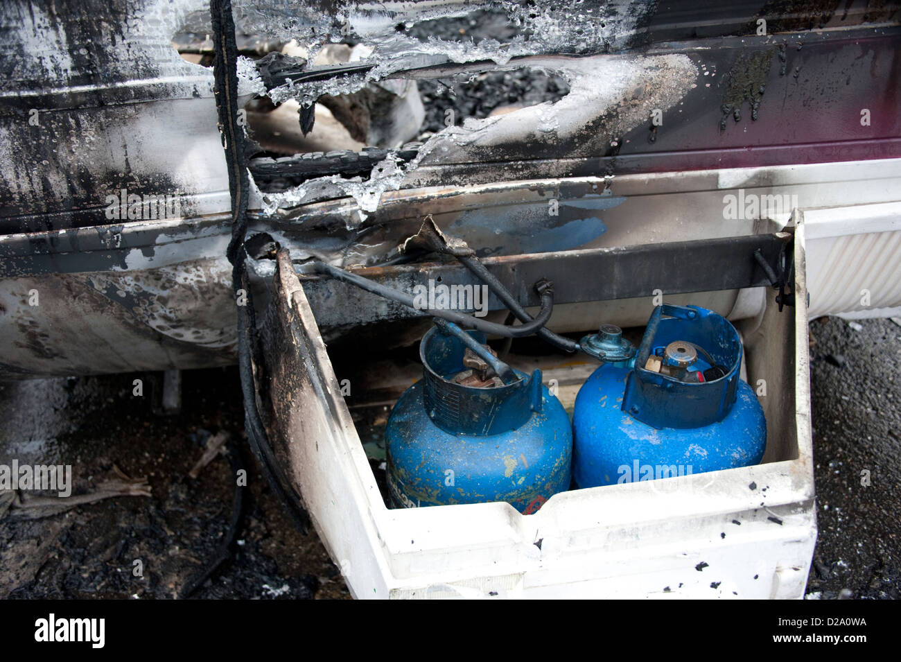 Blue Butane gas cylinder fire burnt accidental Stock Photo Alamy