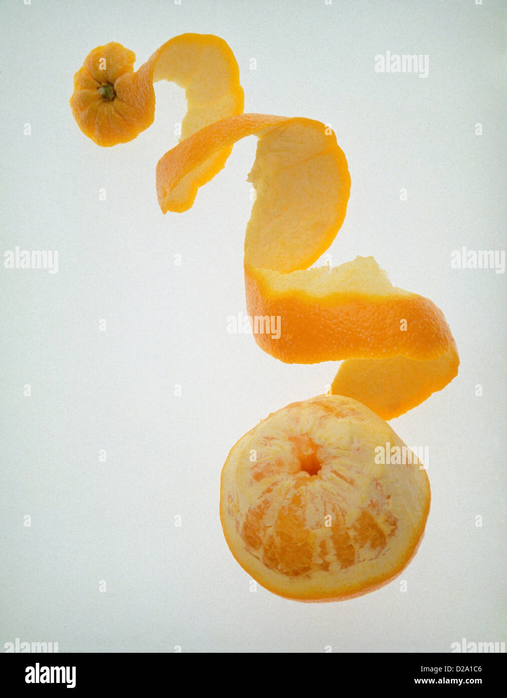 Partially Peeled Orange, With Peel In A Spiral Stock Photo