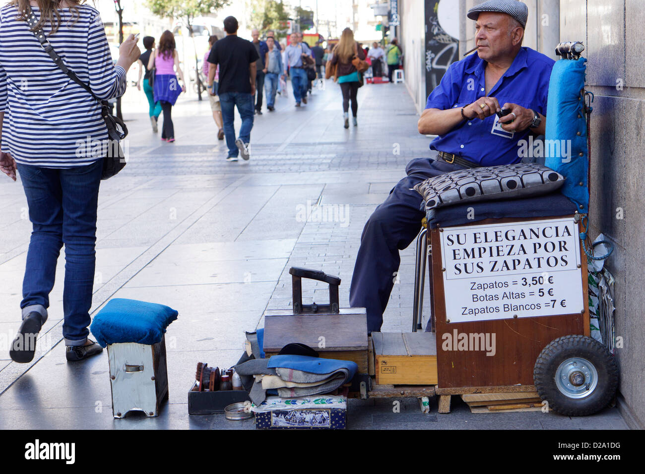 gran via madrid shoe shine shiner spain Stock Photo