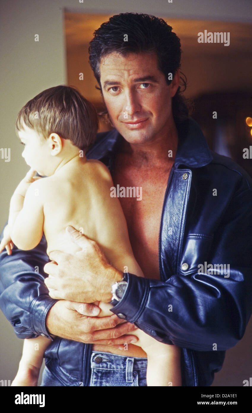 Father and baby son, gentle tough guy, MR 337 Stock Photo