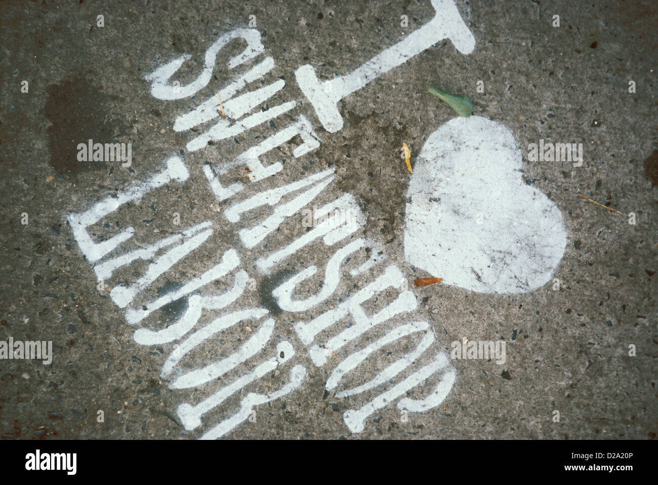 Sidewalk Stencil - I (Heart Shape) Sweatshop Labor Stock Photo