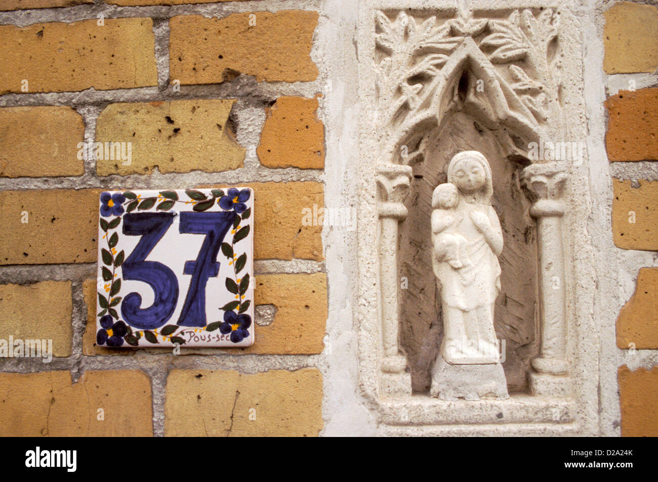 Belgium. Brugge. Bruges. Niche Statue Of Madonna And Child. Stock Photo